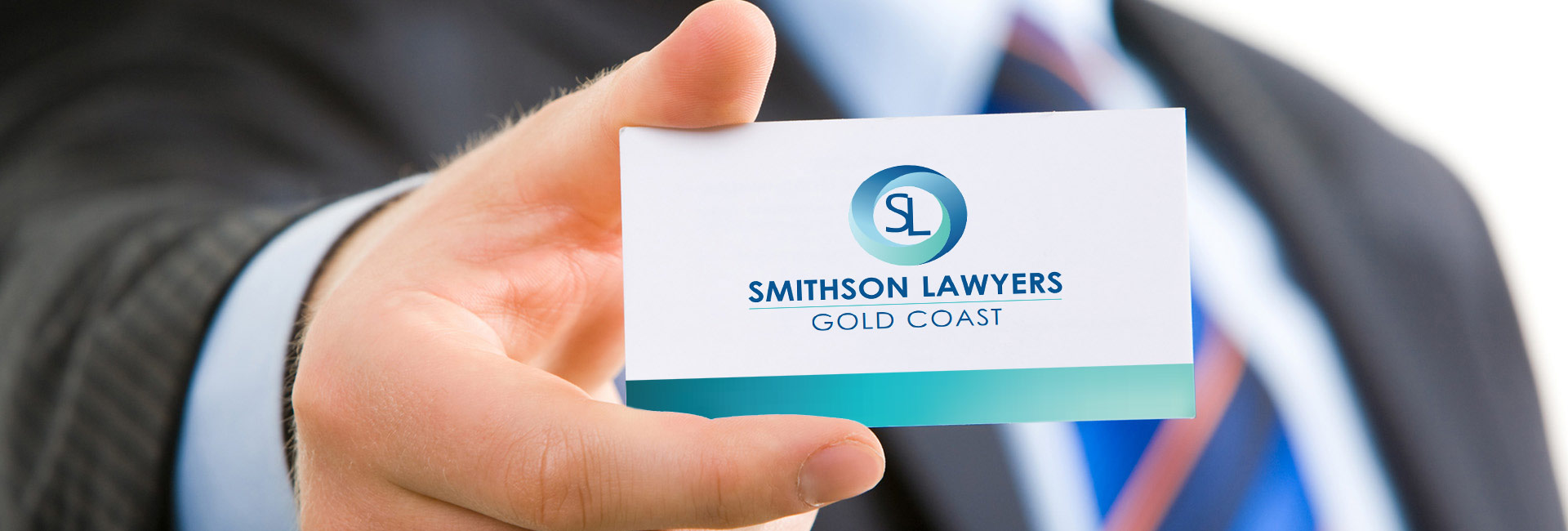Person holding a business card
